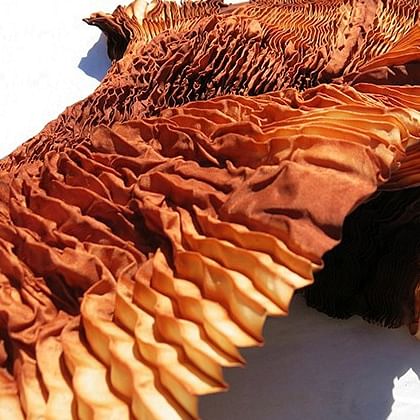 accordian folded fabric dyed with plant dyes