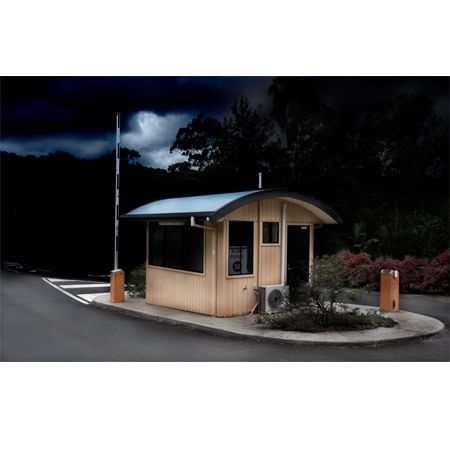 guardhouse in front of a stormy sky