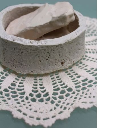 ceramic bowl, weetbix and doily