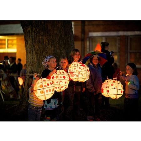group of children holding paper lanterns
