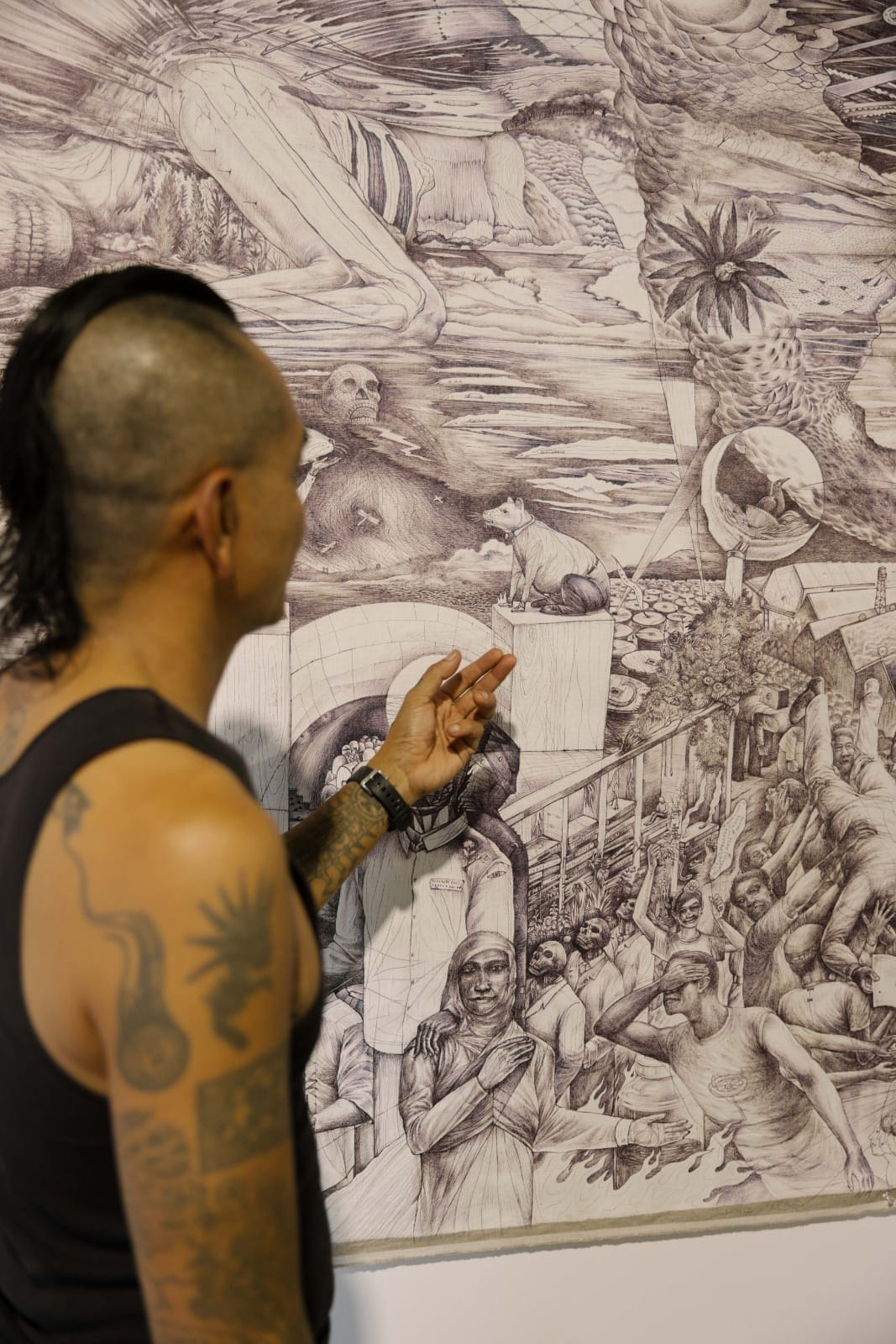 person looking at artwork