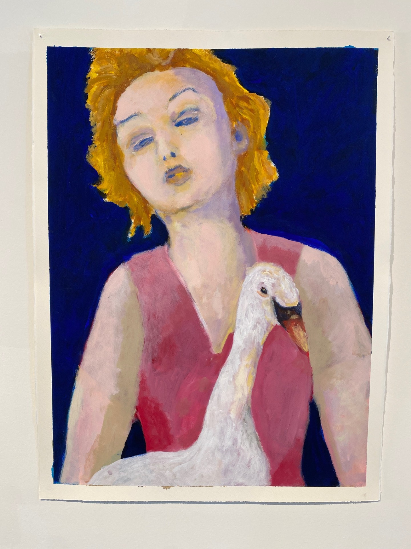 A painting of a woman with blonde hair, a pink dress, with a swan on her lap. The background is blue. 