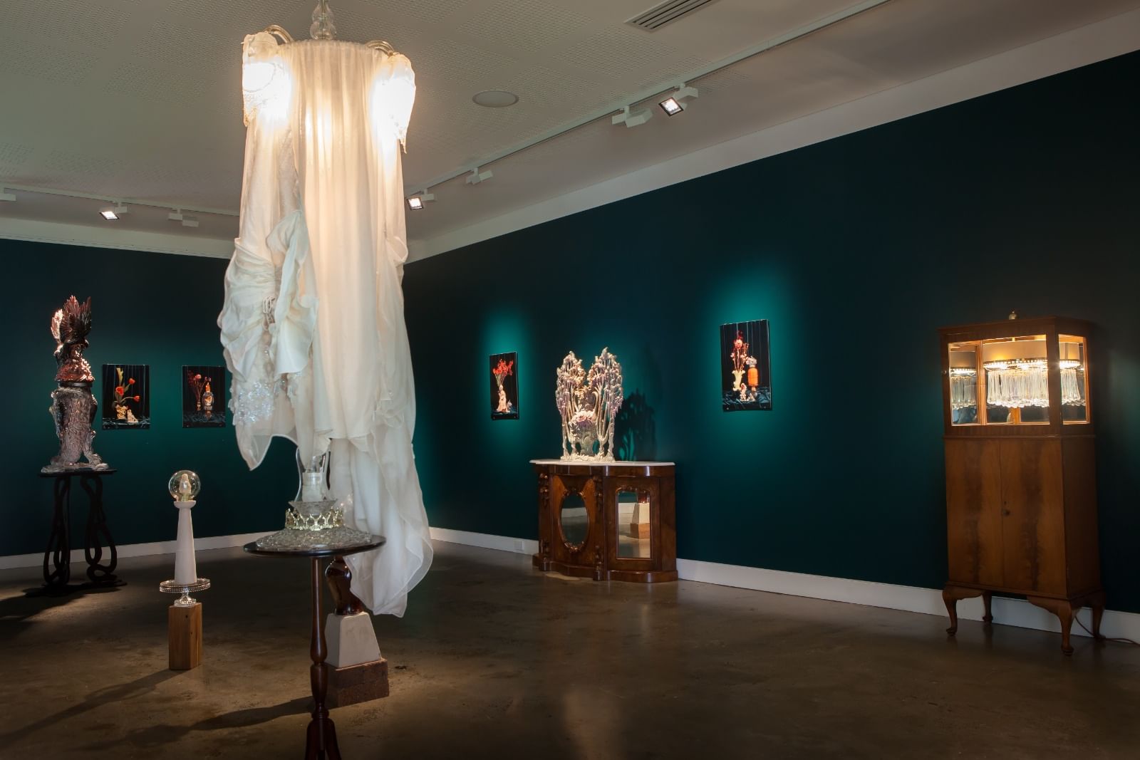 Sculptures and images with formal funiture pieces