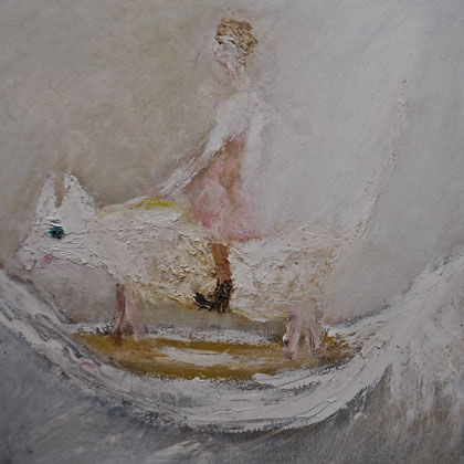 woman riding animal