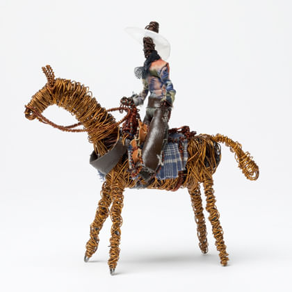 sculpture  of stockman on horse made from recycled materials and copper wire