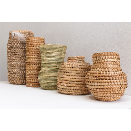 collection of baskets mad from Buchie Rush, Lomandra, Bull Rush, long leafed Pandanus, feather.