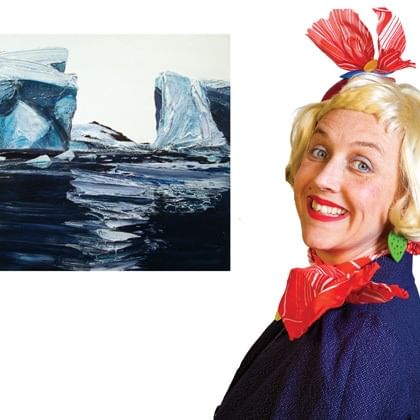 Peggy Popart next to painting of icebergs in the ocean