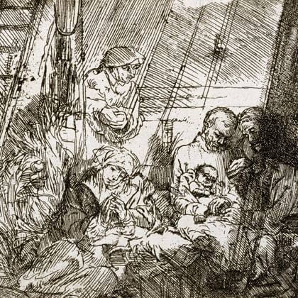 group of people around a baby