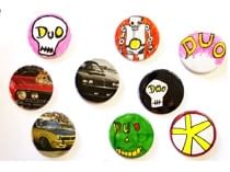 collection of colourful badges