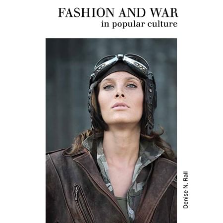 book cover with woman wearing brown leather bomber jacket and aviator goggles on top of her head 
