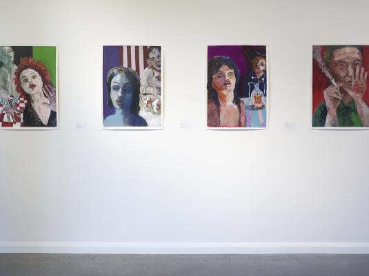 Install photograph of Chas Glover paintings