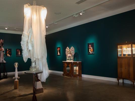 Sculptures and images with formal funiture pieces