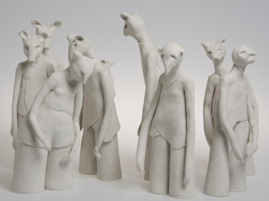 multiple ceramic sculptures representing people