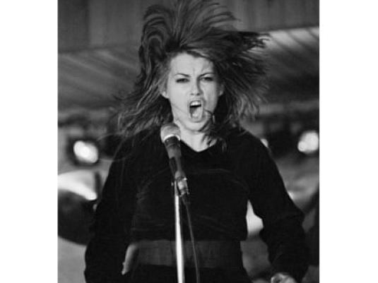 Chrissy Amphlett at microphone singing