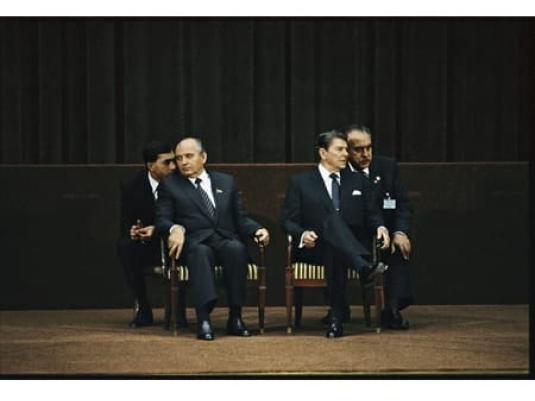 U.S. President Ronald Reagan and Soviet Premier Mikhail Gorbachev with translators