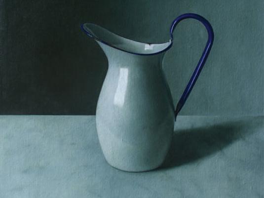 enamel jug on table