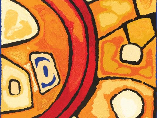 A first nations painting with the colours orange, red, yellow, and small bits of black and blue. It has large concentric circles.